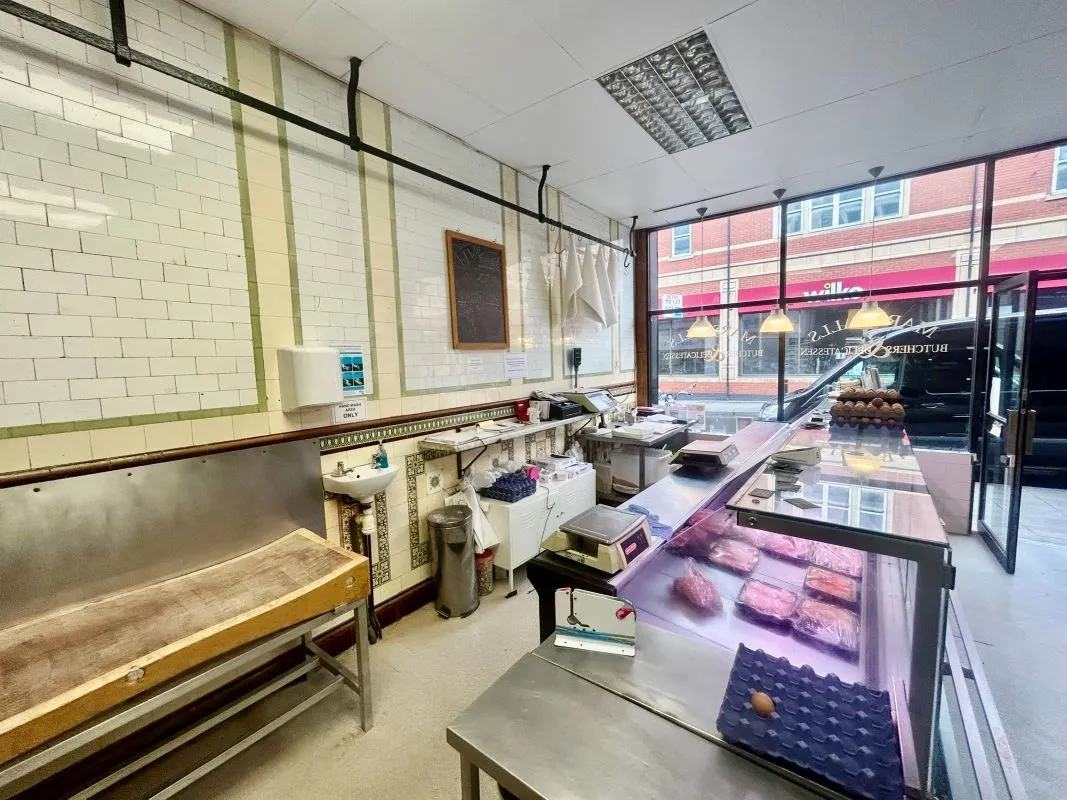 Extensive four storey property in the heart of Barry's retail centre with attractive shop front and huge potential for the upper floors, subject to any necessary consents. Leasehold.