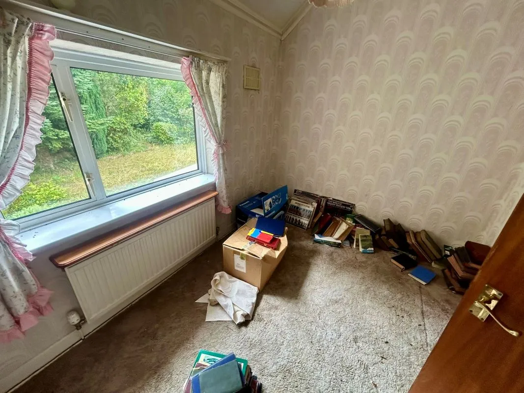 A substantial, four bedroom home in a generous plot with a driveway and double garage. Located on the edge of this popular village close to Abergavenny. In need of repair and improvement throughout.