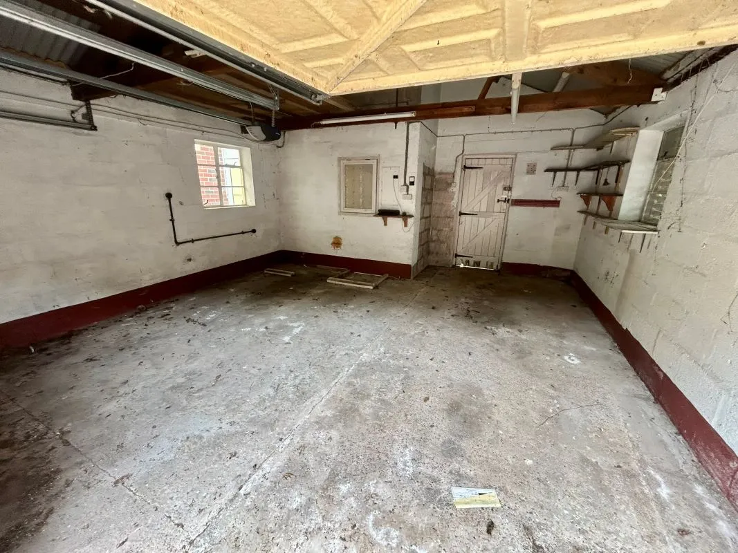 A substantial, four bedroom home in a generous plot with a driveway and double garage. Located on the edge of this popular village close to Abergavenny. In need of repair and improvement throughout.