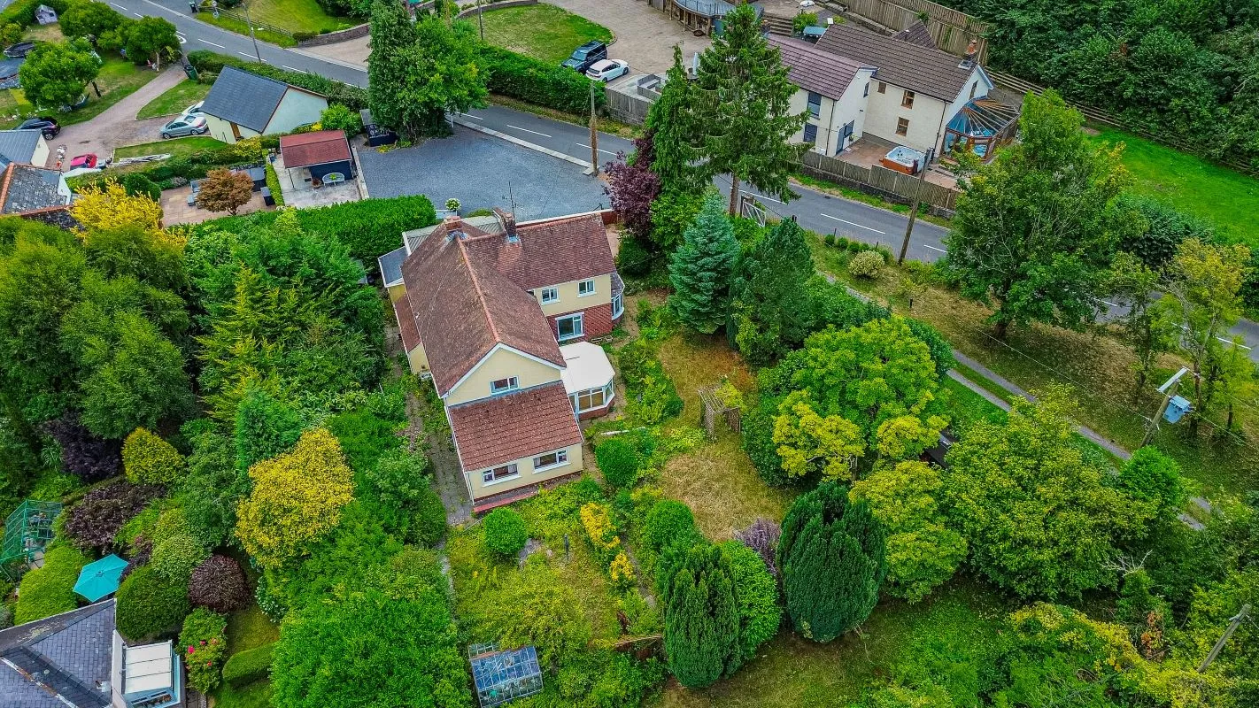 A substantial, four bedroom home in a generous plot with a driveway and double garage. Located on the edge of this popular village close to Abergavenny. In need of repair and improvement throughout.