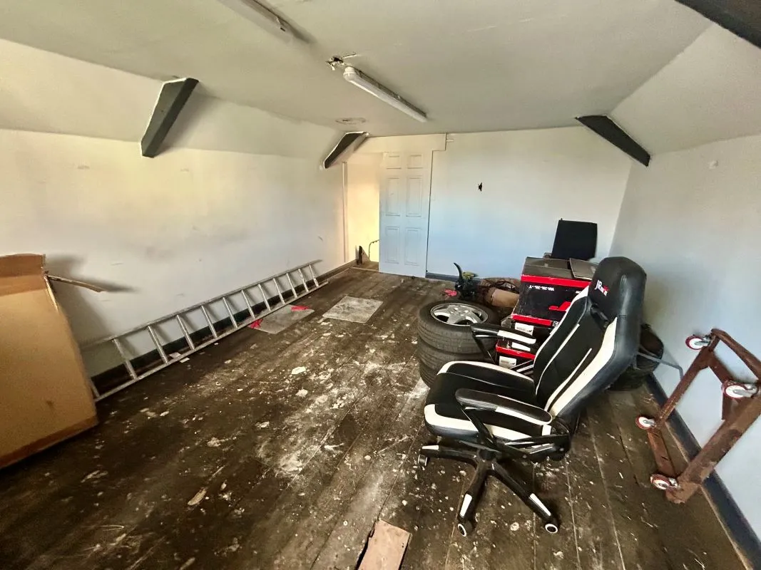 Detached garage/workshop facing Gelligaer Street in Cathays with two storey section to the rear of the property. Sold with vacant possession and with potential for a variety of uses, subject to consents.