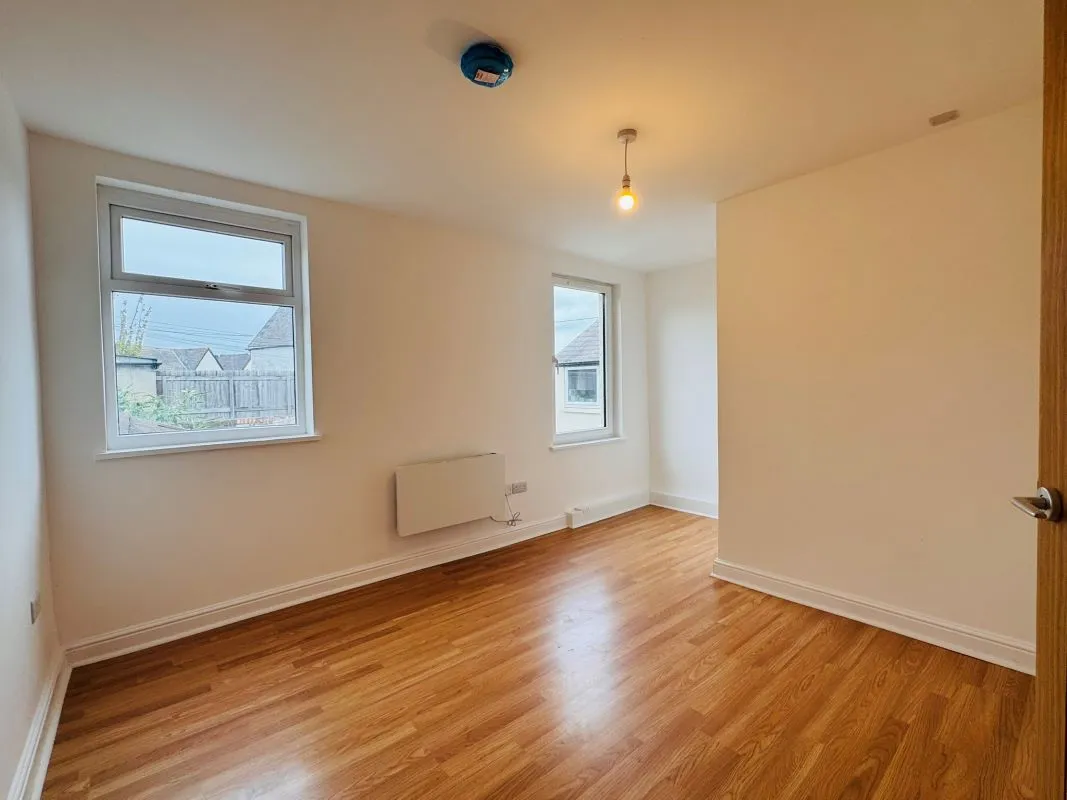 Investment opportunity to purchase a recently renovated split leveled duplex two bedroom flat located on Broadway and within short distance to the city centre.