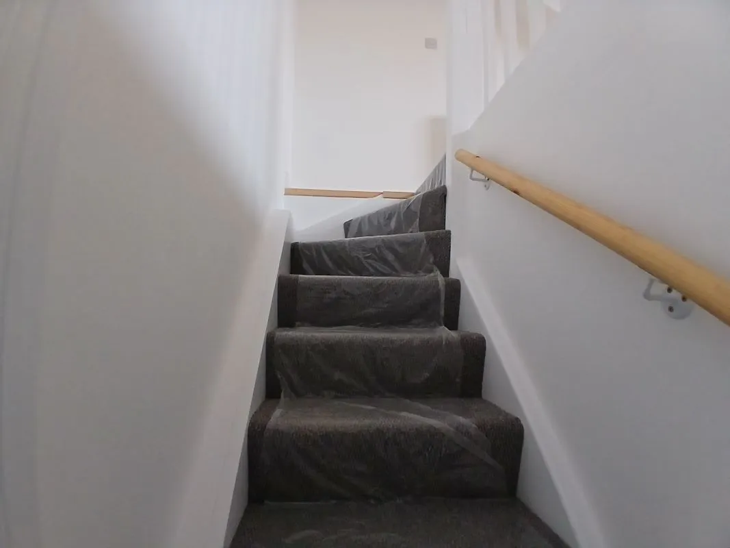 Investment opportunity to purchase a recently renovated split leveled duplex two bedroom flat located on Broadway and within short distance to the city centre.