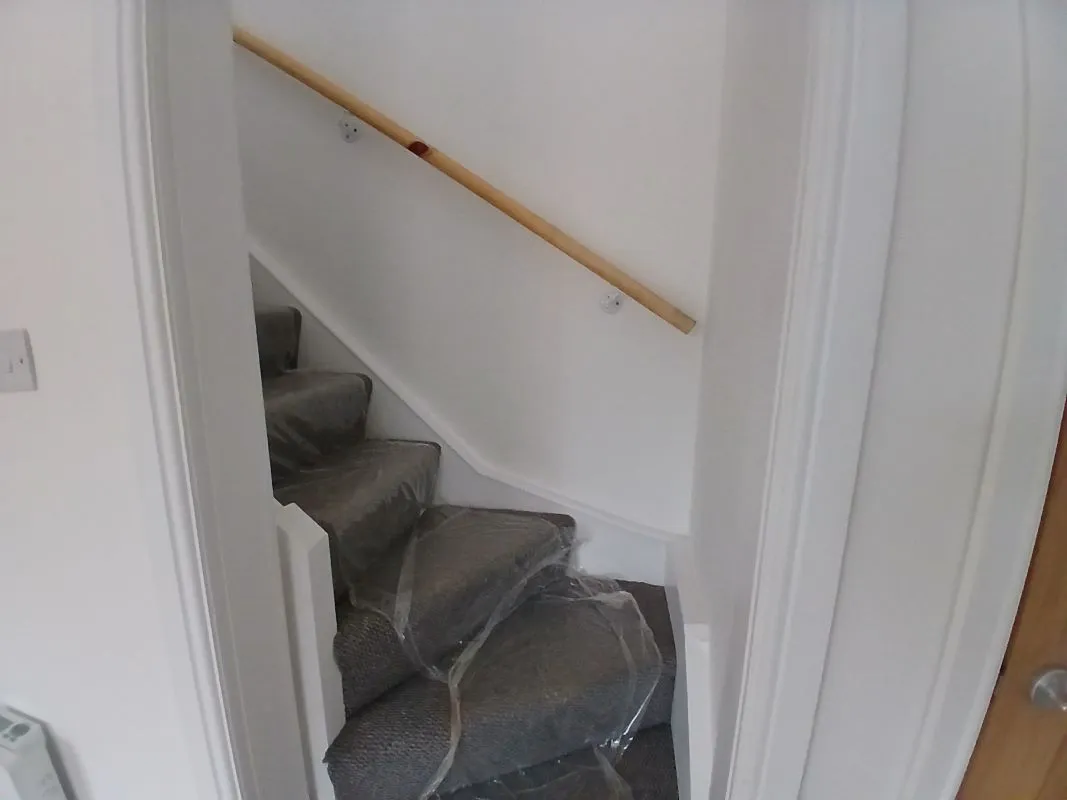 Investment opportunity to purchase a recently renovated split leveled duplex two bedroom flat located on Broadway and within short distance to the city centre.