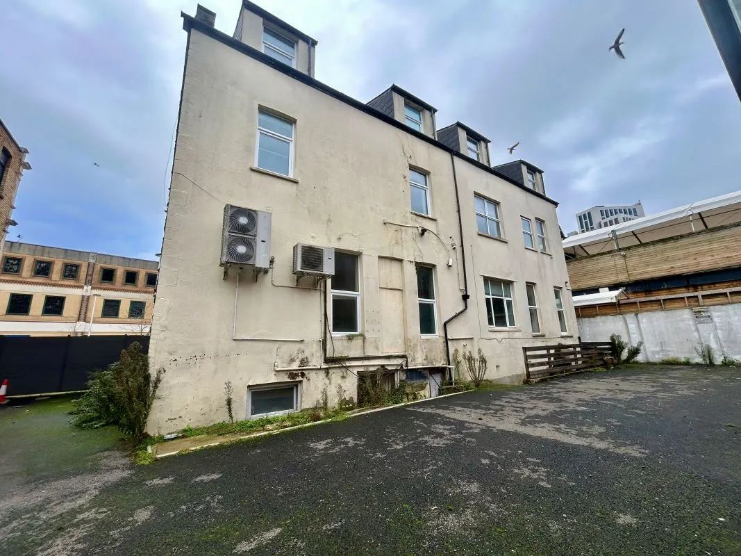A pair of four-storey Victorian villas in the heart of Cardiff city centre with parking to the rear. Currently arranged as office space but could be suitable for a variety of uses, subject to consents. Vacant.
