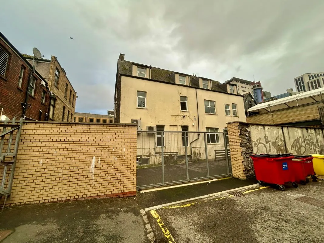 A pair of four-storey Victorian villas in the heart of Cardiff city centre with parking to the rear. Currently arranged as office space but could be suitable for a variety of uses, subject to consents. Vacant.