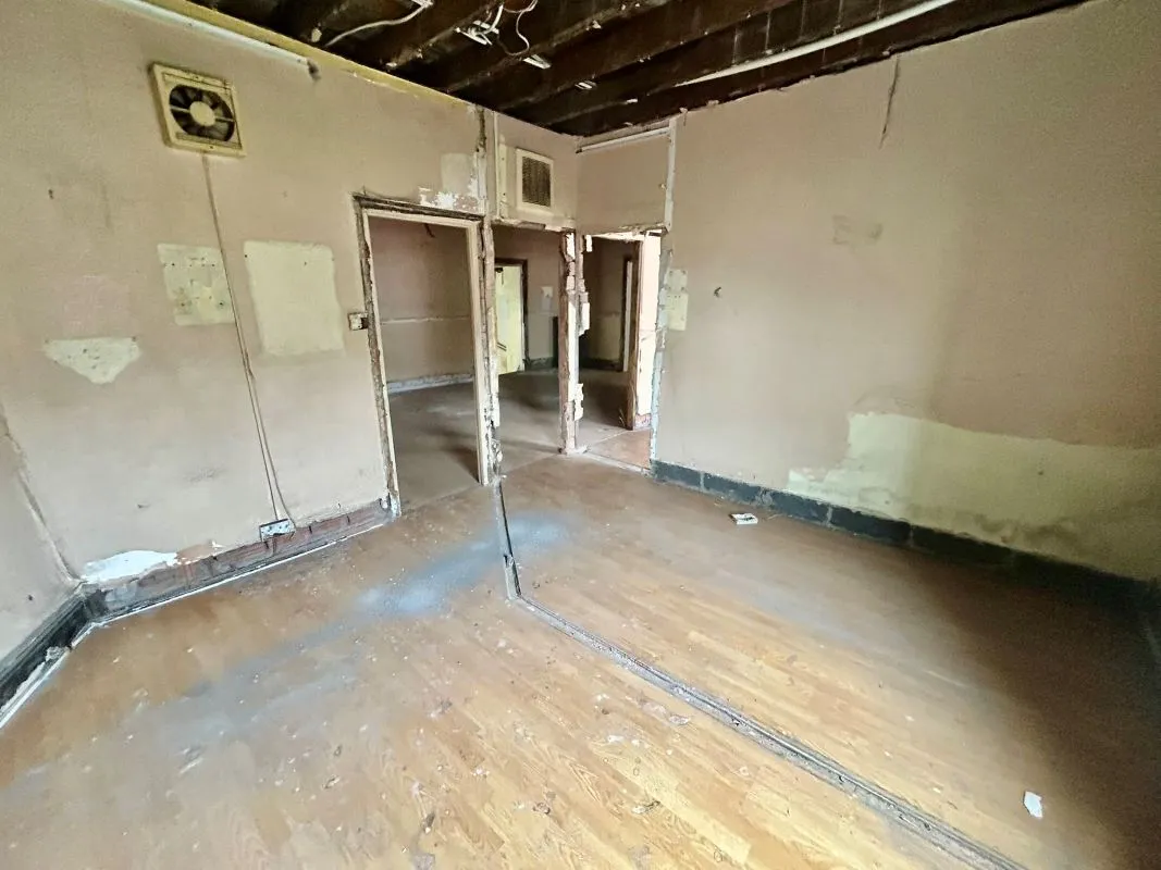 Opportunity to acquire this three storey end of terrace property in Neath. Two commercial units to the ground floor plus a barbers shop with residential redevelopment opportunity to upper floors and a large rear car park with a part-outbuilding also included.