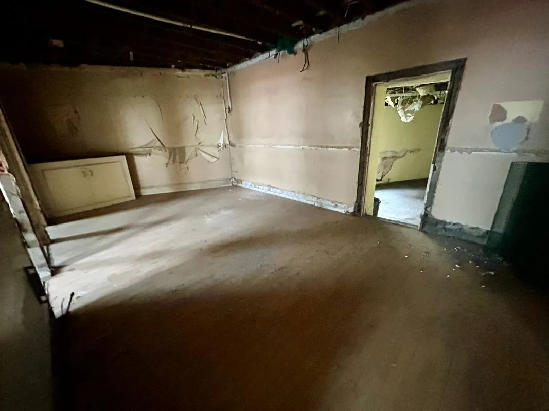 Opportunity to acquire this three storey end of terrace property in Neath. Two commercial units to the ground floor plus a barbers shop with residential redevelopment opportunity to upper floors and a large rear car park with a part-outbuilding also included.