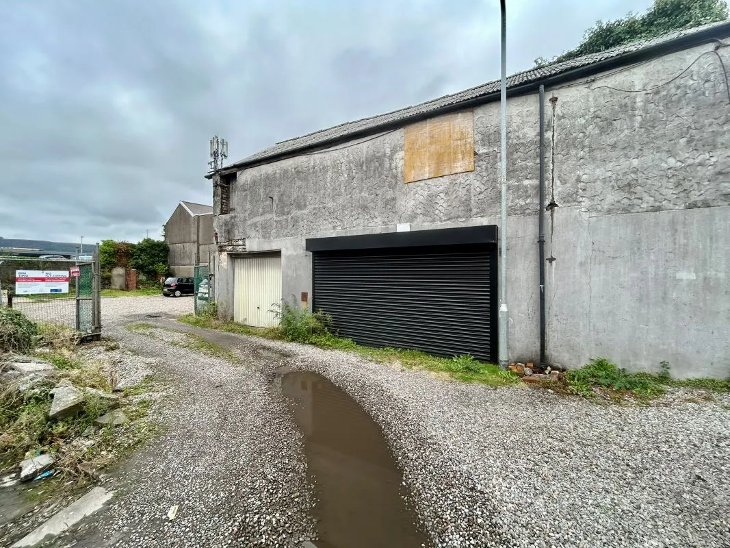 Opportunity to acquire this three storey end of terrace property in Neath. Two commercial units to the ground floor plus a barbers shop with residential redevelopment opportunity to upper floors and a large rear car park with a part-outbuilding also included.