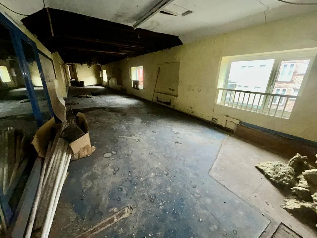 Opportunity to acquire this three storey end of terrace property in Neath. Two commercial units to the ground floor plus a barbers shop with residential redevelopment opportunity to upper floors and a large rear car park with a part-outbuilding also included.