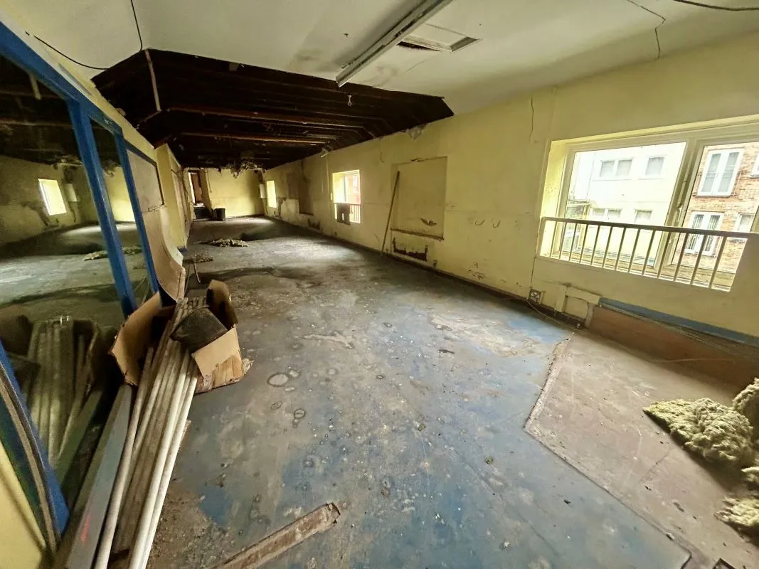 Opportunity to acquire this three storey end of terrace property in Neath. Two commercial units to the ground floor plus a barbers shop with residential redevelopment opportunity to upper floors and a large rear car park with a part-outbuilding also included.