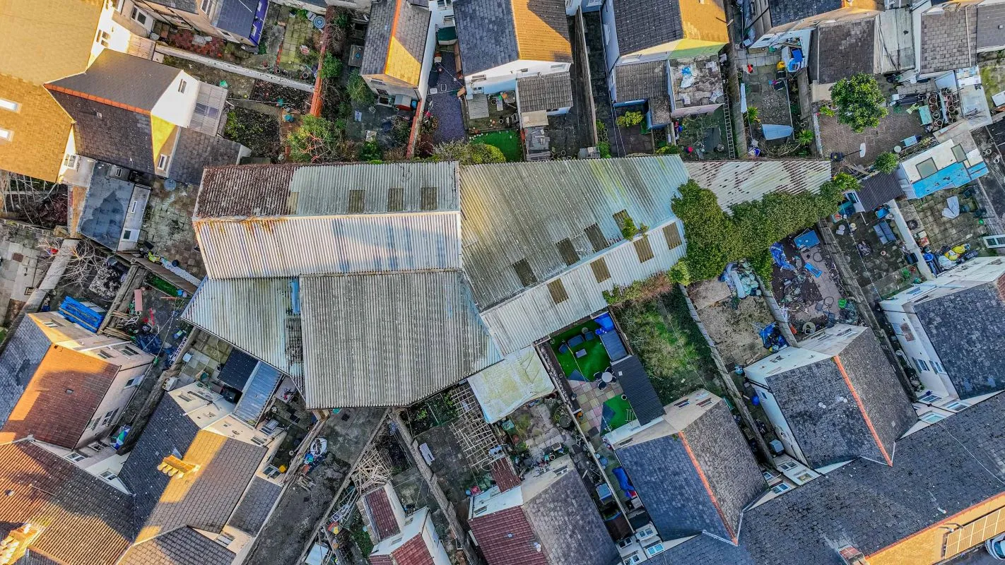 Large warehouse/workshop extending to approximately 5400 sq ft (502 sqm) which could be suitable for a wide variety of uses or complete redevelopment, subject to any necessary consents.