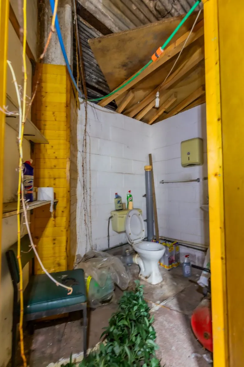 Large warehouse/workshop extending to approximately 5400 sq ft (502 sqm) which could be suitable for a wide variety of uses or complete redevelopment, subject to any necessary consents.