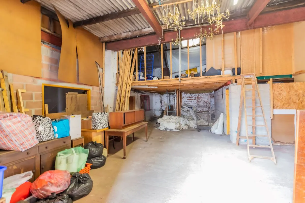 Large warehouse/workshop extending to approximately 5400 sq ft (502 sqm) which could be suitable for a wide variety of uses or complete redevelopment, subject to any necessary consents.