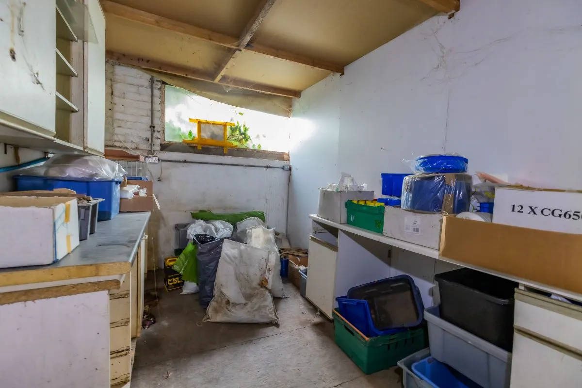 Large warehouse/workshop extending to approximately 5400 sq ft (502 sqm) which could be suitable for a wide variety of uses or complete redevelopment, subject to any necessary consents.