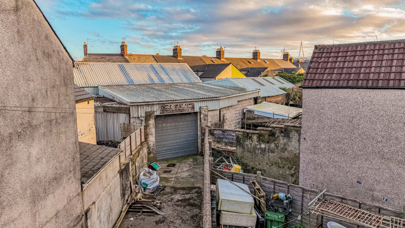 Large warehouse/workshop extending to approximately 5400 sq ft (502 sqm) which could be suitable for a wide variety of uses or complete redevelopment, subject to any necessary consents.