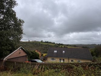 REDUCED - Development land with planning consent to erect two four bedroom detached dwellings with associated retaining works and new road access at the rear of Llancayo Street in Bargoed.