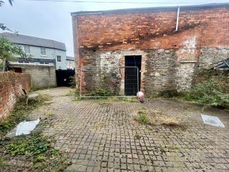 Extensive three-storey Investment/Development property in prominent corner position including detached coach house to the rear. Potential for further development, subject to any necessary consents.