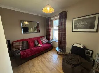Bay-fronted end of terrace property converted into two apartments in this popular and well regarded area of Llanelli.
