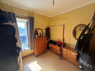 Bay-fronted end of terrace property converted into two apartments in this popular and well regarded area of Llanelli.