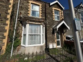 Bay-fronted end of terrace property converted into two apartments in this popular and well regarded area of Llanelli.