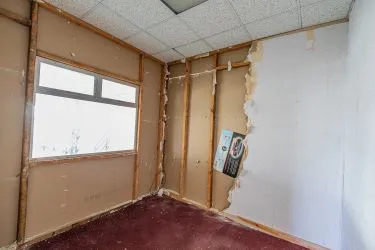 Freehold detached two storey commercial building with open space on the ground floor and ancillary space to the first floor and parking spaces to the front of the property. Could be used for variety of uses subject to necessary consent.