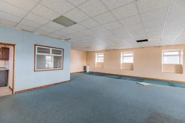 Freehold detached two storey commercial building with open space on the ground floor and ancillary space to the first floor and parking spaces to the front of the property. Could be used for variety of uses subject to necessary consent.