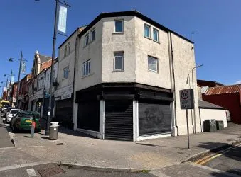 Opportunity to acquire this freehold mixed use corner property with ground floor commercial unit and x2 flats occupying a high street presence on Thompson Street in Barry.