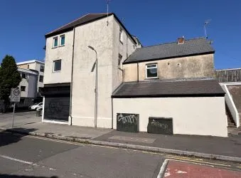 Opportunity to acquire this freehold mixed use corner property with ground floor commercial unit and x2 flats occupying a high street presence on Thompson Street in Barry.