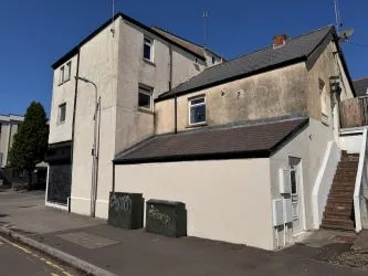 Opportunity to acquire this freehold mixed use corner property with ground floor commercial unit and x2 flats occupying a high street presence on Thompson Street in Barry.