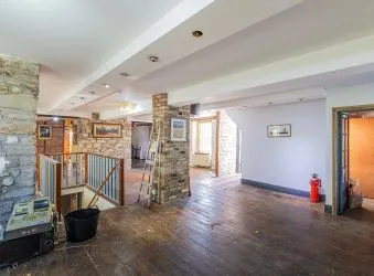 Extensive semi-detached former pub and most recently gift shop and gallery (Fabio) which has been partly re-developed to offer four apartments to the upper floors (two completed) with further potential to the lower floors for commercial or residential use, (subject to consents).