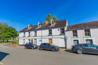 Extensive semi-detached former pub and most recently gift shop and gallery (Fabio) which has been partly re-developed to offer four apartments to the upper floors (two completed) with further potential to the lower floors for commercial or residential use, (subject to consents).
