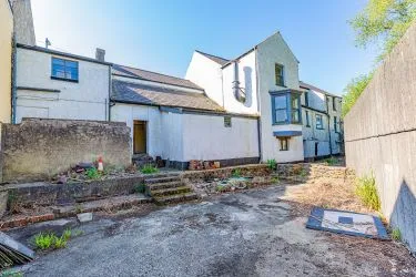 Extensive semi-detached former pub and most recently gift shop and gallery (Fabio) which has been partly re-developed to offer four apartments to the upper floors (two completed) with further potential to the lower floors for commercial or residential use, (subject to consents).