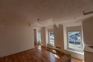 Extensive semi-detached former pub and most recently gift shop and gallery (Fabio) which has been partly re-developed to offer four apartments to the upper floors (two completed) with further potential to the lower floors for commercial or residential use, (subject to consents).