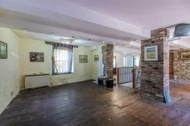 Extensive semi-detached former pub and most recently gift shop and gallery (Fabio) which has been partly re-developed to offer four apartments to the upper floors (two completed) with further potential to the lower floors for commercial or residential use, (subject to consents).