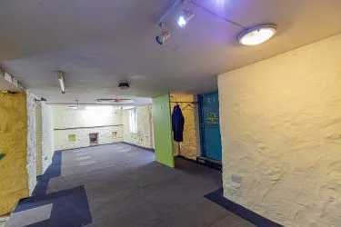 Extensive semi-detached former pub and most recently gift shop and gallery (Fabio) which has been partly re-developed to offer four apartments to the upper floors (two completed) with further potential to the lower floors for commercial or residential use, (subject to consents).