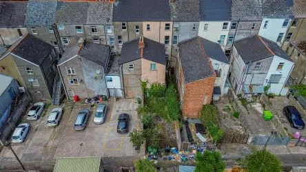Extensive four storey property in the heart of Barry's retail centre with attractive shop front and huge potential for the upper floors, subject to any necessary consents. Leasehold.