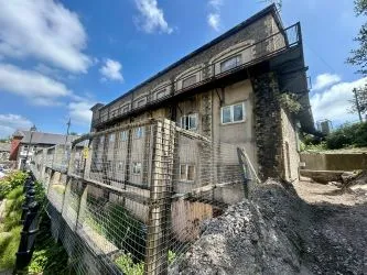 Substantial three storey building on the edge of Tonypandy town centre. Full planning permission awarded for the conversion to 18 residential units and 5 commercial units. Planning ref - 15/1055/FUL