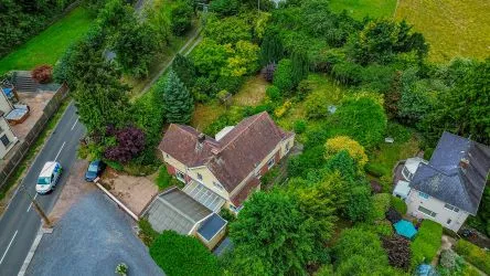 A substantial, four bedroom home in a generous plot with a driveway and double garage. Located on the edge of this popular village close to Abergavenny. In need of repair and improvement throughout.