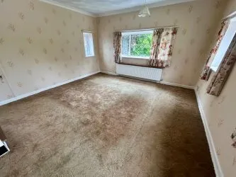 A substantial, four bedroom home in a generous plot with a driveway and double garage. Located on the edge of this popular village close to Abergavenny. In need of repair and improvement throughout.