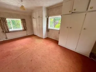A substantial, four bedroom home in a generous plot with a driveway and double garage. Located on the edge of this popular village close to Abergavenny. In need of repair and improvement throughout.