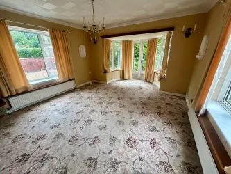 A substantial, four bedroom home in a generous plot with a driveway and double garage. Located on the edge of this popular village close to Abergavenny. In need of repair and improvement throughout.