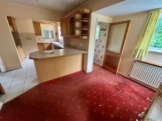 A substantial, four bedroom home in a generous plot with a driveway and double garage. Located on the edge of this popular village close to Abergavenny. In need of repair and improvement throughout.