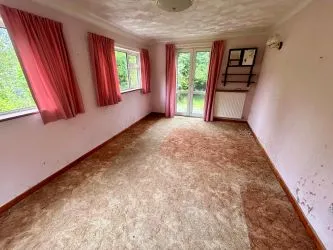 A substantial, four bedroom home in a generous plot with a driveway and double garage. Located on the edge of this popular village close to Abergavenny. In need of repair and improvement throughout.