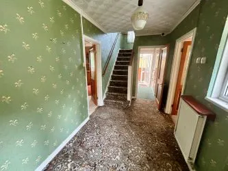 A substantial, four bedroom home in a generous plot with a driveway and double garage. Located on the edge of this popular village close to Abergavenny. In need of repair and improvement throughout.