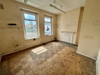 Partly let Investment property of two retail units and one large apartment across the whole first floor, in this popular run of shops at the Victoria park end of Cowbridge Road East.
