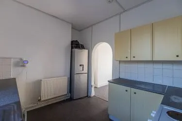 Larger than usual double bay-fronted one bedroom ground floor apartment with its own entrance in this popular area of Barry. In reasonable order but in need of decorative improvement throughout