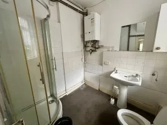 Larger than usual double bay-fronted one bedroom ground floor apartment with its own entrance in this popular area of Barry. In reasonable order but in need of decorative improvement throughout