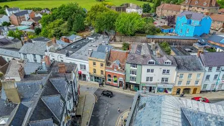 Attractive Grade II listed former bank in this prominent position in the centre of Monmouth with accommodation over three floors including the basement.