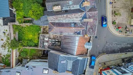 Attractive Grade II listed former bank in this prominent position in the centre of Monmouth with accommodation over three floors including the basement.